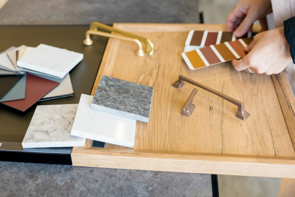 Designer woman choosing details of new kitchen in a home improvement store